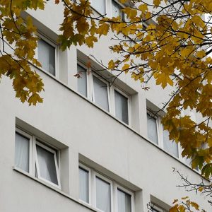 White reversible PVCu windows for large apartment block